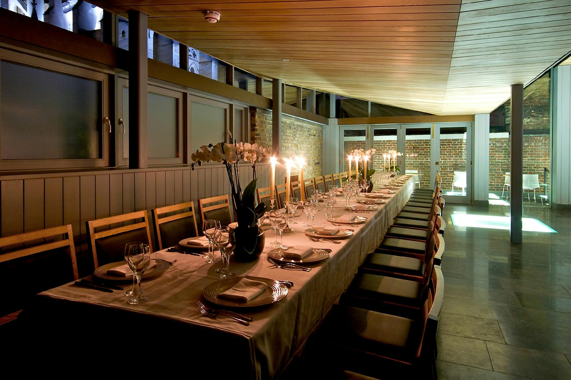 Elegant dining table in Cellarium, Westminster Abbey for corporate dinners and intimate gatherings.